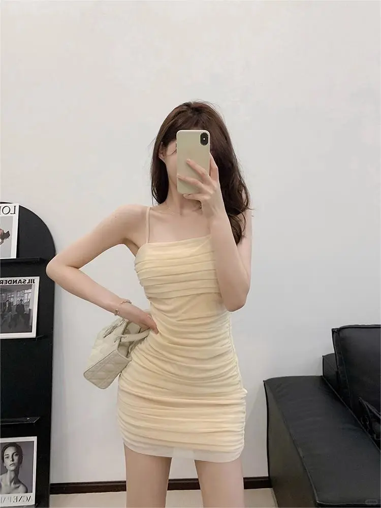 这件杏色吊带裙好辣~~
