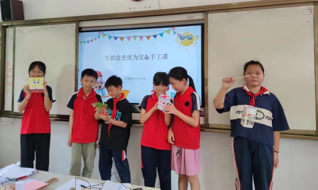 石头镇甘冲小学:变废为宝,牛奶盒变身环保艺术品 第1张