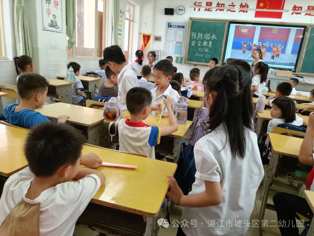 初探小学,“幼”见成长—湛江市坡头区第二幼儿园大班参观湛江市实验小学活动 第23张