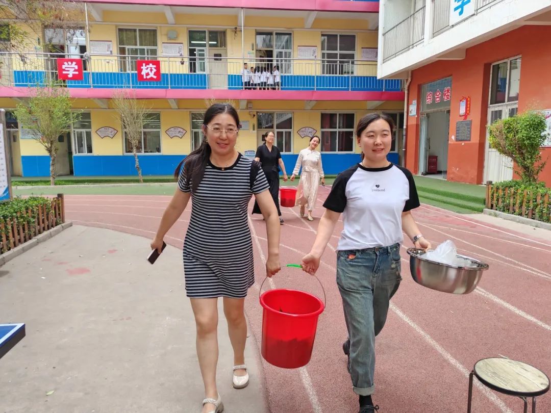 四型机关(学校)建设 || 沙河市第七小学“粽情端午 共言智善”教职工包粽子活动 第10张